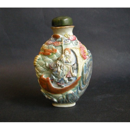 Snuff bottle porcelain molded and sculpted with the history of the legendary explorer Zhang Qian during a shipwreck